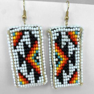 White beaded earrings with design